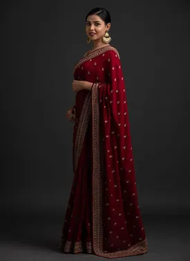 Amazing Maroon Color Silk Base Saree With Zari And Sequins Work Border