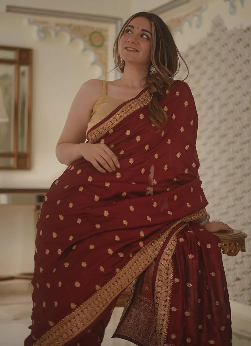 Amazing Maroon Color Silk Base Saree With Zari And Sequins Work Border