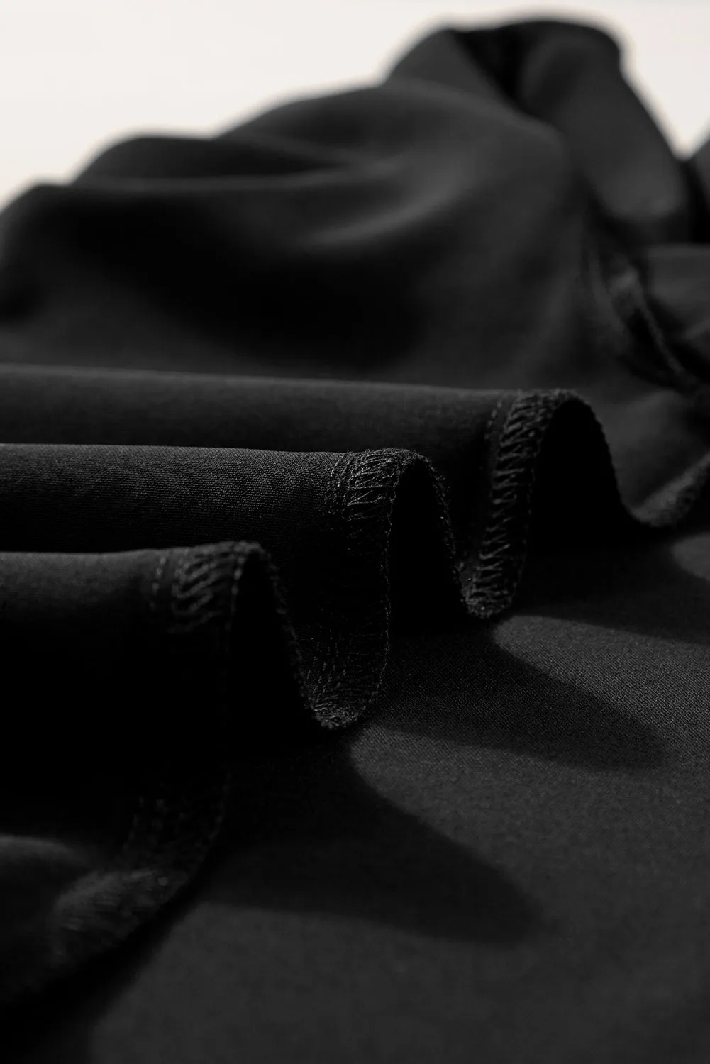 Black Scalloped V-Neck Petal Sleeve Top
